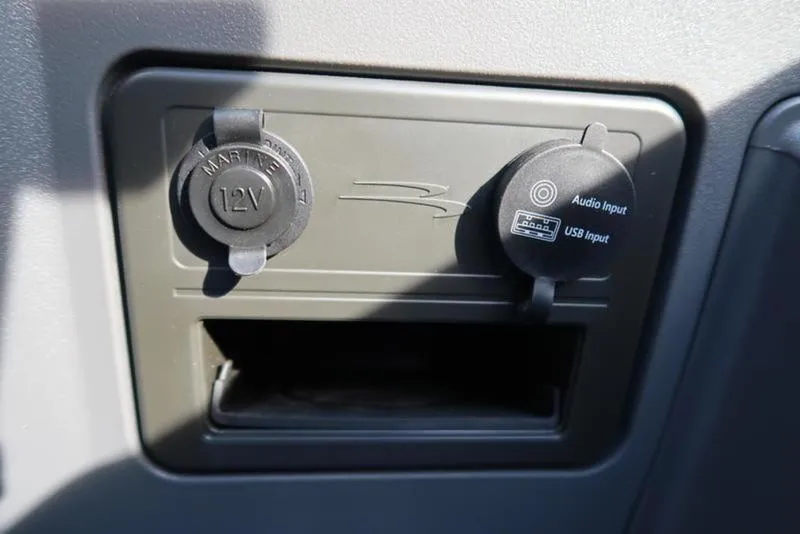 Slide: The Image of 12V and USB audio input panel on 2025 Bennington 22 SSB boat. - 20