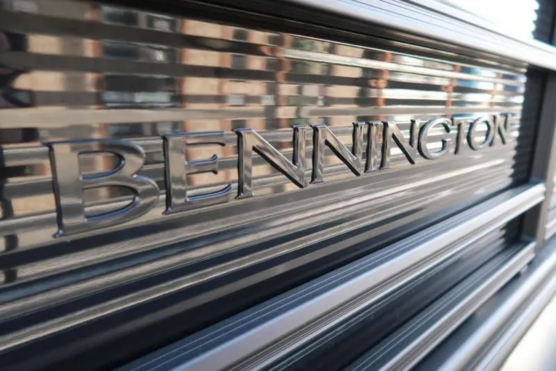 Slide: The Image of 2025 Bennington 22 SSB boat logo on sleek metallic surface. - 6