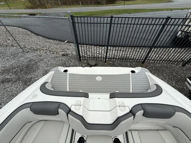 Slide: The Image of 2020 Yamaha Boats SX190 interior with sleek seating and modern design. - 5