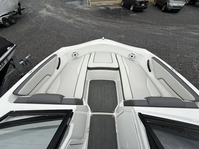 Slide: The Image of 2020 Yamaha Boats SX190 interior with spacious seating and sleek design. - 9