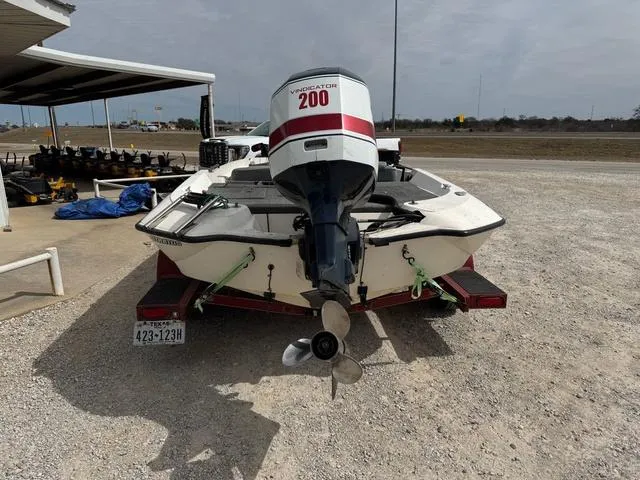 Slide: The Image of 1994 Stratos 201 PRO boat with Vindicator 200 engine on a trailer. - 3
