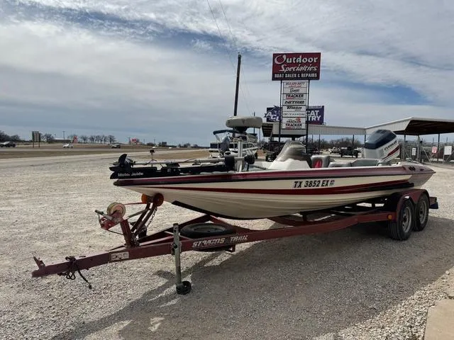 Slide: The Image of 1994 Stratos 201 PRO boat on trailer at Outdoor Specialties dealership. - 5