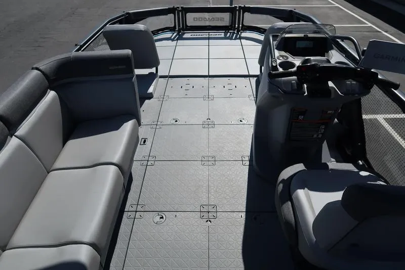 Slide: The Image of 2023 Sea-Doo Switch® Sport 21-230 hp Galvanized boat interior with seating and control console. - 15