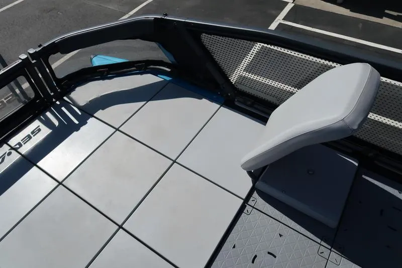 Slide: The Image of 2023 Sea-Doo Switch® Sport 21-230 hp deck with seating, showcasing modern design and functionality. - 20