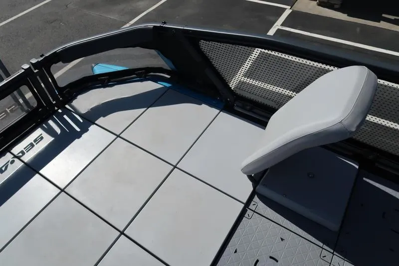 Slide: The Image of 2023 Sea-Doo Switch® Sport 21-230 hp Galvanized deck with seating, showcasing modern design. - 21