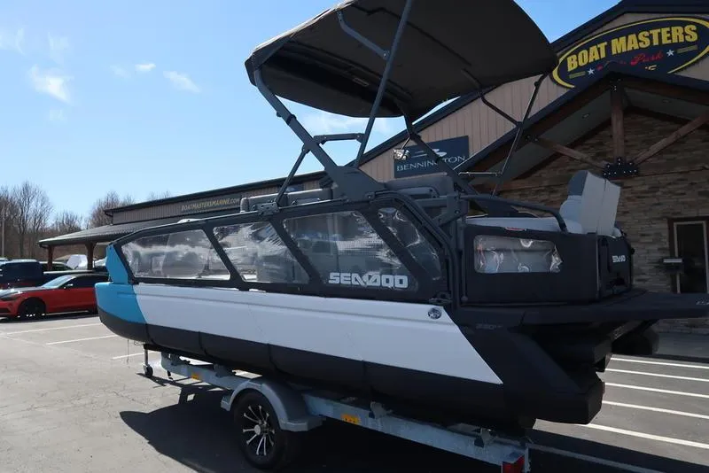 Slide: The Image of 2023 Sea-Doo Switch® Sport 21-230 hp Galvanized boat on trailer at dealership. - 4