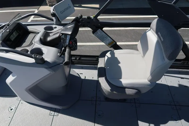 Slide: The Image of 2023 Sea-Doo Switch® Sport 21-230 hp Galvanized boat cockpit with steering and seating. - 43