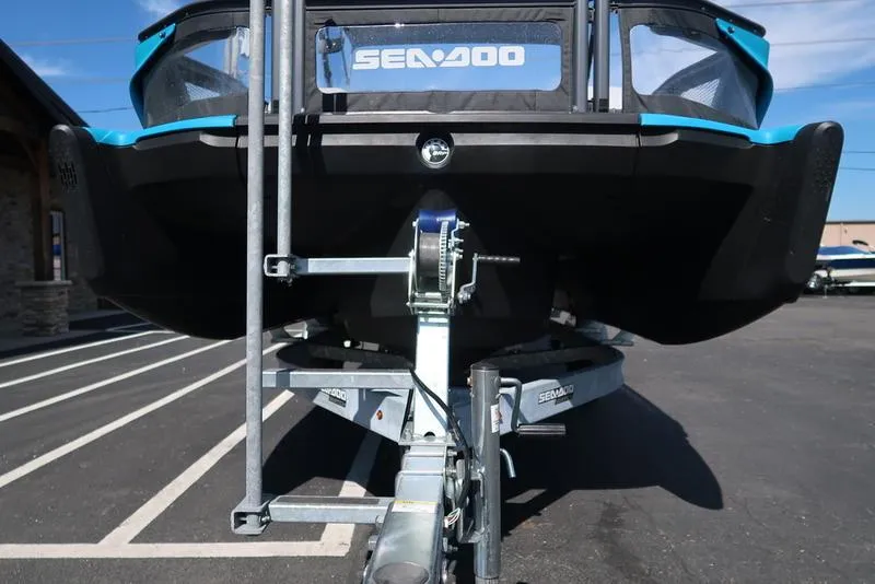 Slide: The Image of 2023 Sea-Doo Switch® Sport 21-230 hp on trailer, rear view in parking lot. - 9