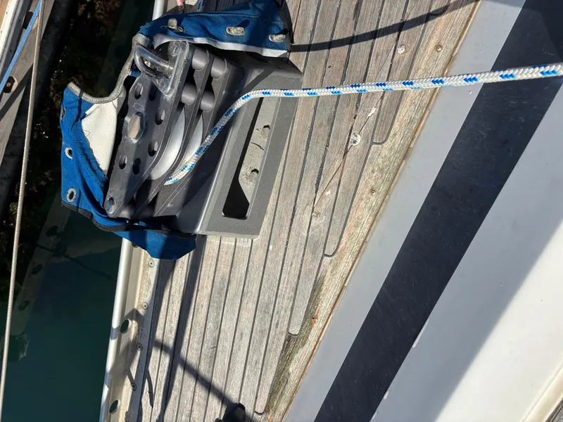 Slide: The Image of Deck detail of 1994 Nautor Swan 46 MK II sailboat with rope and pulley system. - 13