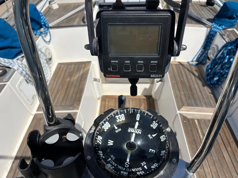 Slide: The Image of Cockpit view of 1994 Nautor Swan 46 MK II sailboat with compass and navigation instruments. - 17