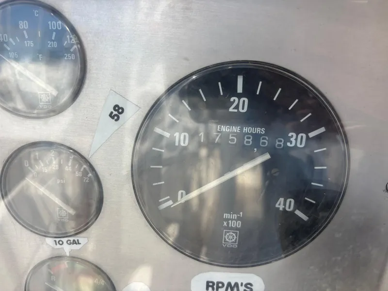 Slide: The Image of Close-up of Nautor Swan 46 MK II 1994 engine hour meter showing 7586.8 hours. - 19