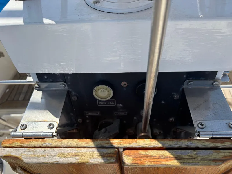 Slide: The Image of Control panel of 1994 Nautor Swan 46 MK II yacht, featuring metal and wood elements. - 24