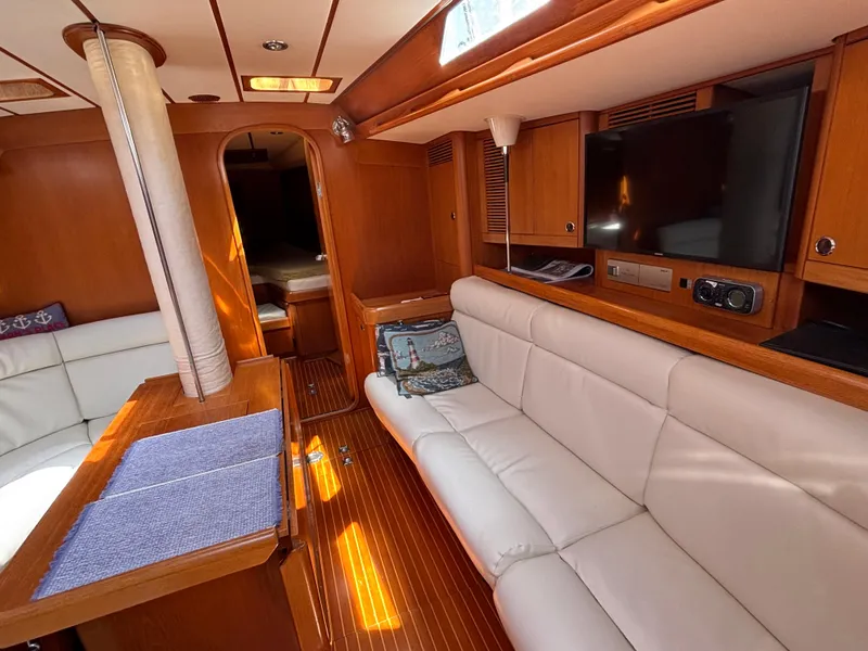 Slide: The Image of Luxurious interior of 1994 Nautor Swan 46 MK II yacht with white leather seating. - 28