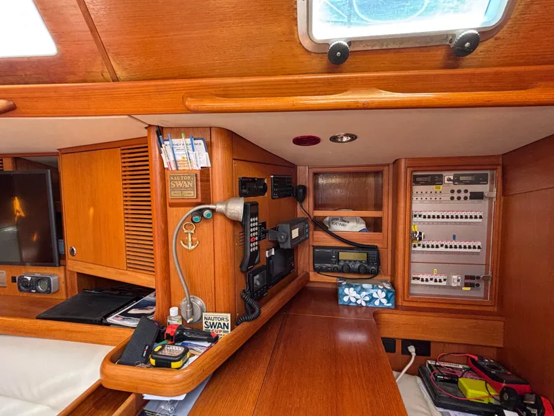 Slide: The Image of Navigation station of 1994 Nautor Swan 46 MK II yacht with communication equipment. - 39