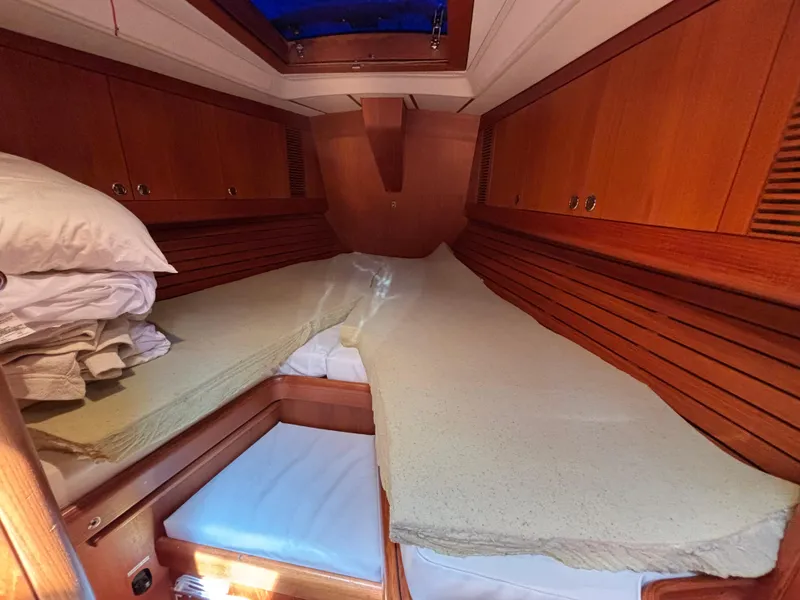 Slide: The Image of Cozy cabin interior of 1994 Nautor Swan 46 MK II yacht with wooden finish. - 44