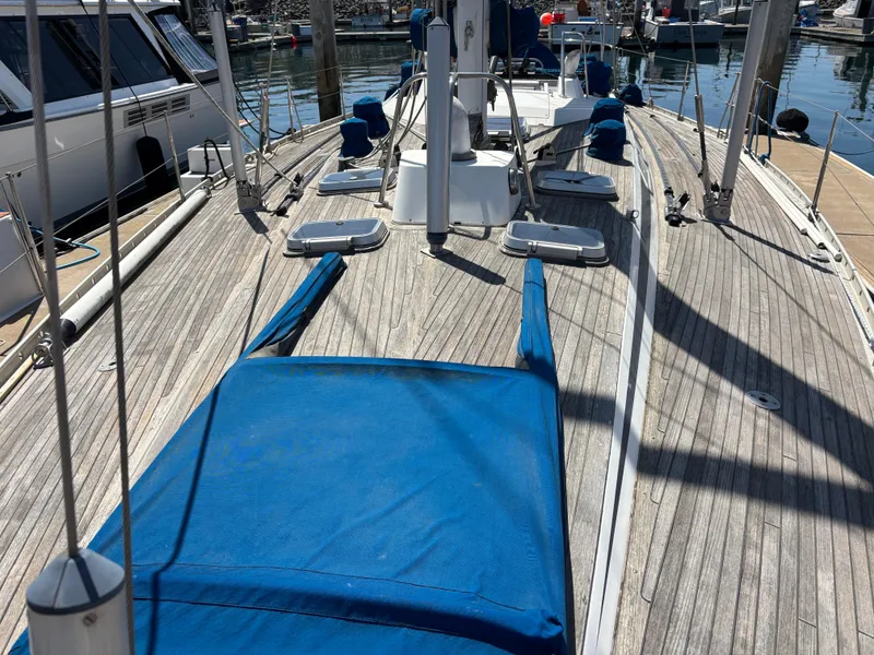 Slide: The Image of Nautor Swan 46 MK II sailboat deck, 1994 model, with blue covers and wooden finish. - 7