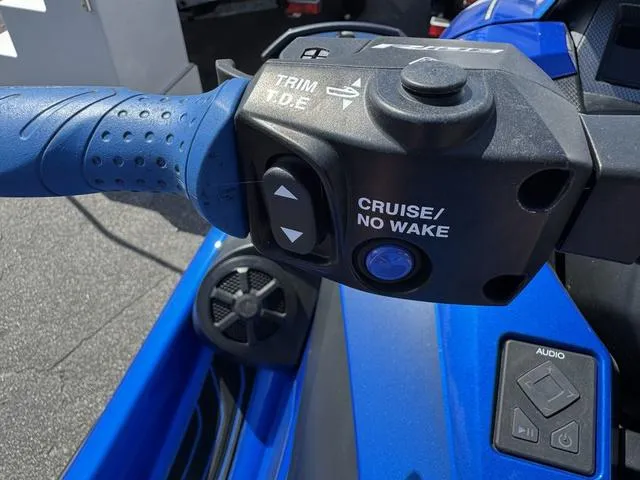 Slide: The Image of 2023 Yamaha WaveRunner GP1800R handlebar controls with cruise and trim features. - 10