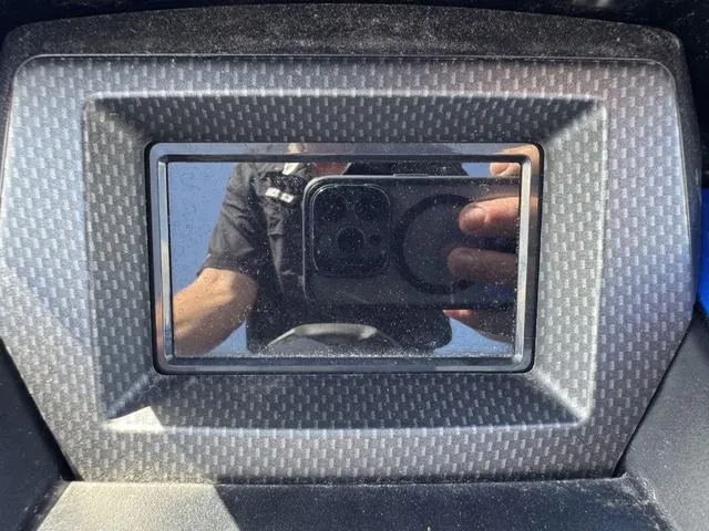Slide: The Image of Close-up of a 2023 Yamaha WaveRunner GP1800R dashboard with reflective screen. - 13