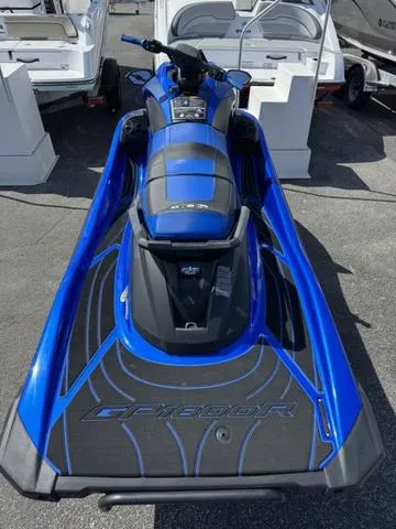 Slide: The Image of 2023 Yamaha WaveRunner GP1800R in blue, displayed outdoors. - 6