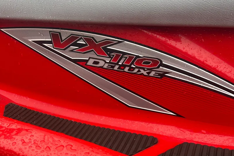 Slide: The Image of 2006 Yamaha WaveRunner VX 110 Deluxe logo on red body with raindrops. - 14