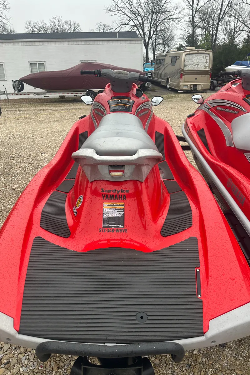 Slide: The Image of 2006 Yamaha WaveRunner VX 110 Deluxe, red, parked on gravel lot. - 15