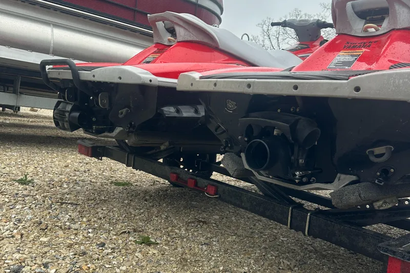 Slide: The Image of 2006 Yamaha WaveRunner VX 110 Deluxe on trailer, rear view, parked on gravel. - 17