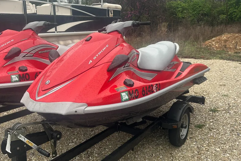 Slide: The Image of 2006 Yamaha WaveRunner VX 110 Deluxe, red, on trailer, parked outdoors. - 4