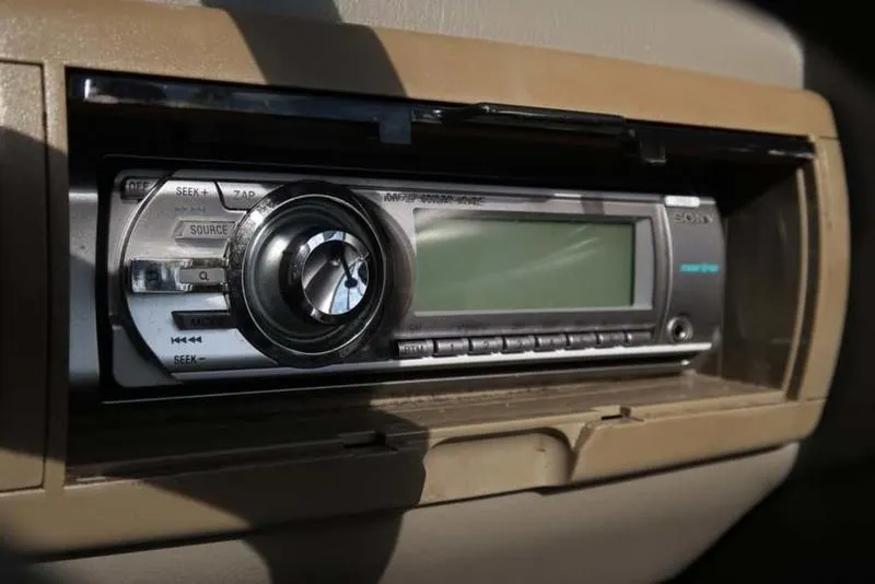 Slide: The Image of Sony marine stereo in a 2011 Crownline 18 SS boat dashboard. - 11