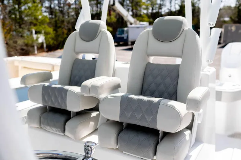 Slide: The Image of Luxury seating on 2023 Front Runner 33 Center Console boat, featuring plush, ergonomic design. - 15