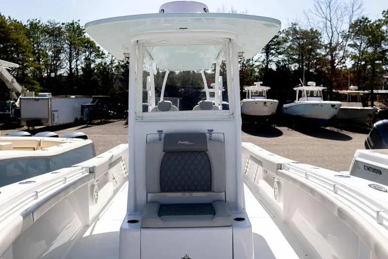 Slide: The Image of 2023 Front Runner 33 Center Console boat, featuring sleek design and spacious seating. - 20