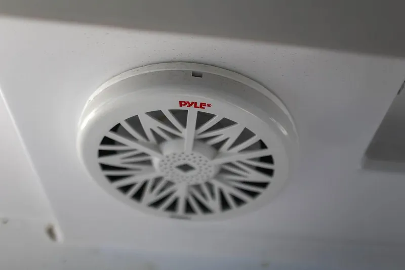 Slide: The Image of Ceiling-mounted Pyle speaker in 2023 Front Runner 33 Center Console boat. - 25