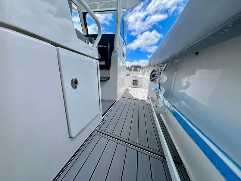 Slide: The Image of 2024 Everglades 285 Center Console boat interior with sleek design and modern features. - 21