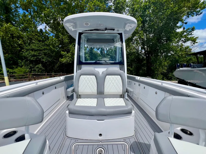 Slide: The Image of 2024 Everglades 285 Center Console boat with sleek seating and modern design. - 33