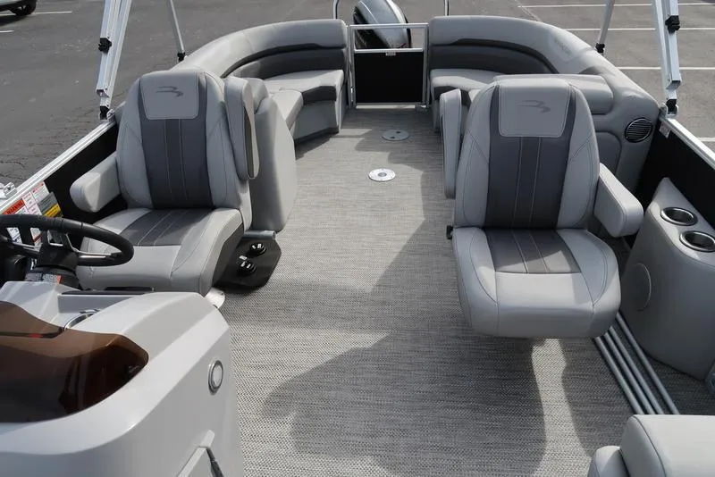 Slide: The Image of 2024 Bennington 22 SXSR pontoon boat interior with gray seating and modern design. - 14