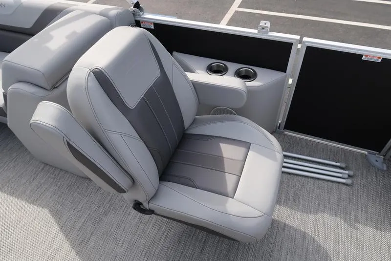 Slide: The Image of 2024 Bennington 22 SXSR boat seat with cup holders, gray upholstery, and modern design. - 18