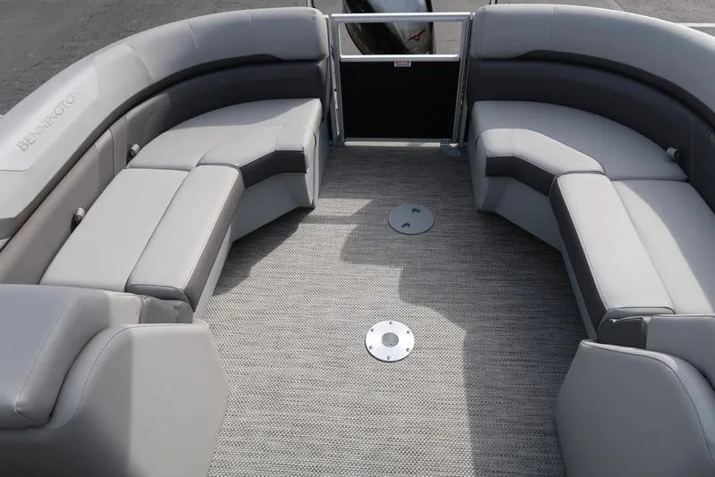 Slide: The Image of 2024 Bennington 22 SXSR pontoon boat interior with gray seating and carpeted floor. - 19