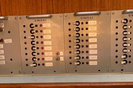 Slide: The Image of Electrical panel on 1981 C&C Landfall 35 sailboat, featuring 12-volt DC switches. - 6