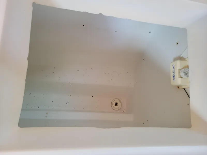 Slide: The Image of Empty storage compartment on a 2001 Jeanneau Sun Odyssey 37 sailboat. - 22