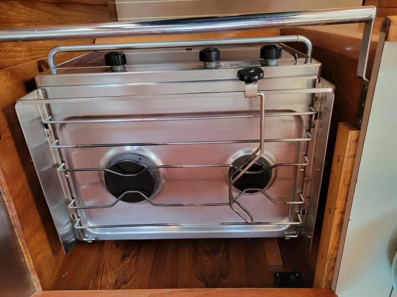 Slide: The Image of Stainless steel stove in 2001 Jeanneau Sun Odyssey 37 yacht galley. - 23