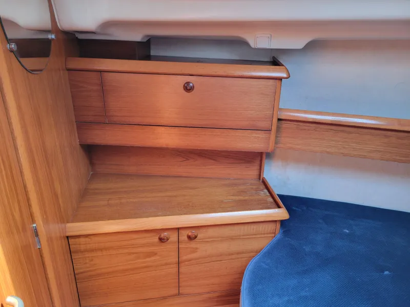 Slide: The Image of Interior cabin storage of 2001 Jeanneau Sun Odyssey 37 sailboat with wooden drawers. - 30