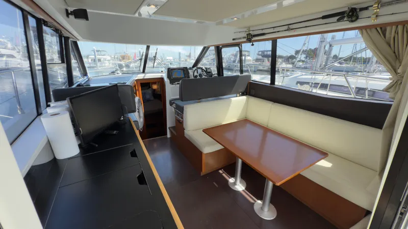 Slide: The Image of Interior of 2016 Jeanneau Velasco 37F yacht with seating and navigation area. - 11
