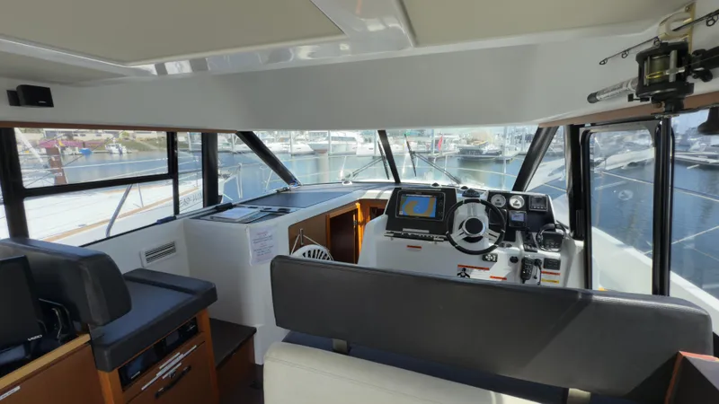 Slide: The Image of Interior view of 2016 Jeanneau Velasco 37F yacht cockpit with navigation equipment. - 13