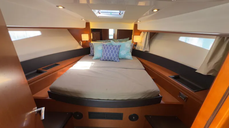 Slide: The Image of Cabin interior of 2016 Jeanneau Velasco 37F with cozy bed and modern design. - 19