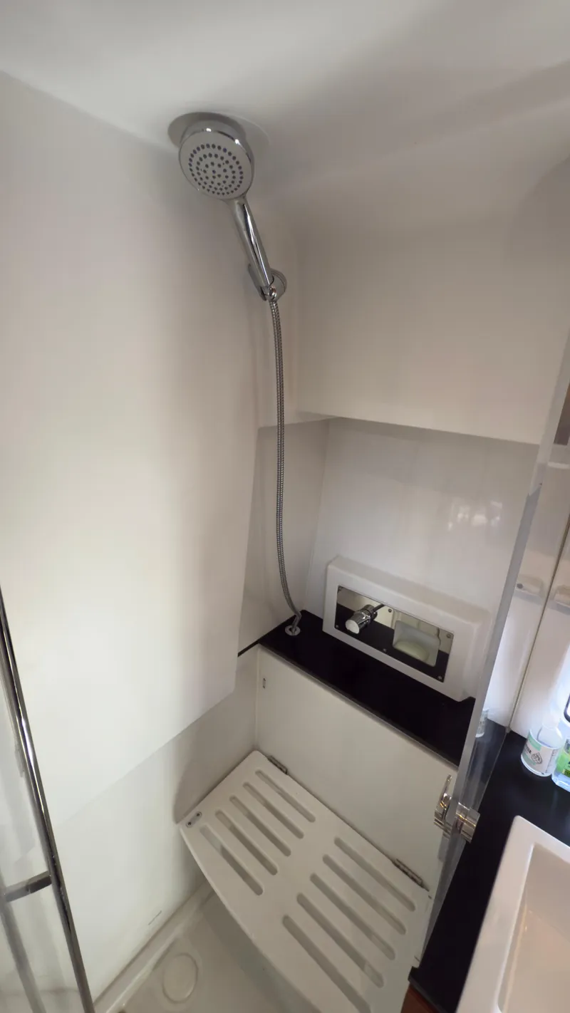 Slide: The Image of Shower area in 2016 Jeanneau Velasco 37F yacht, featuring modern fixtures and sleek design. - 23