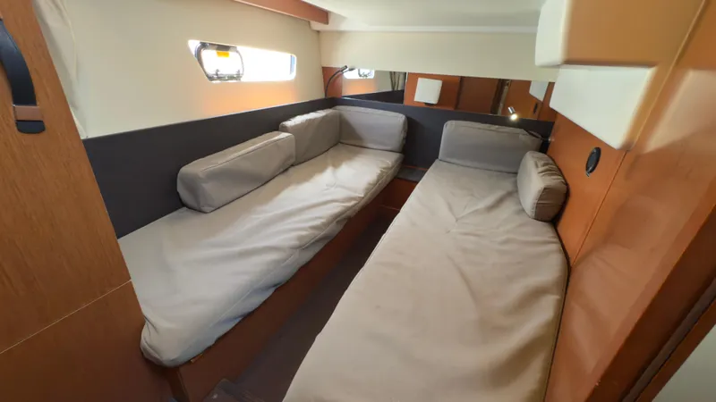 Slide: The Image of 2016 Jeanneau Velasco 37F cabin interior with twin beds and modern design. - 24