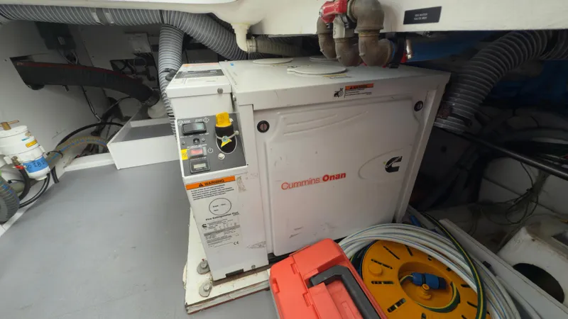 Slide: The Image of Engine room of 2016 Jeanneau Velasco 37F with Cummins Onan generator. - 29