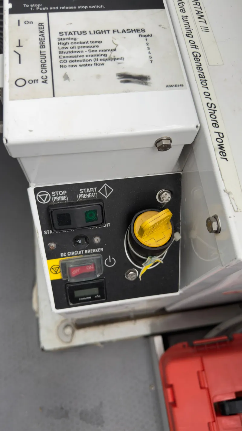 Slide: The Image of Control panel of a 2016 Jeanneau Velasco 37F boat, featuring various switches and indicators. - 30