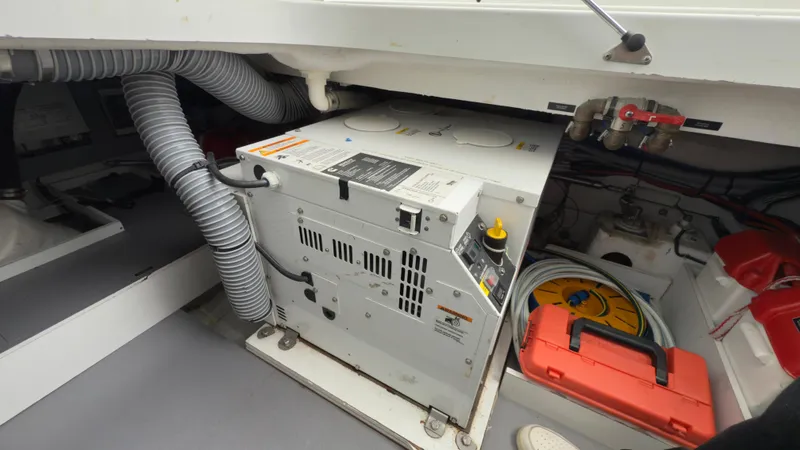 Slide: The Image of Engine room of 2016 Jeanneau Velasco 37F with generator and equipment. - 31