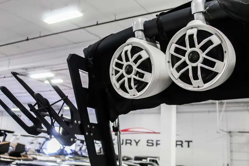 Slide: The Image of 2019 Axis A24 boat speakers and wakeboard rack in a showroom. - 32