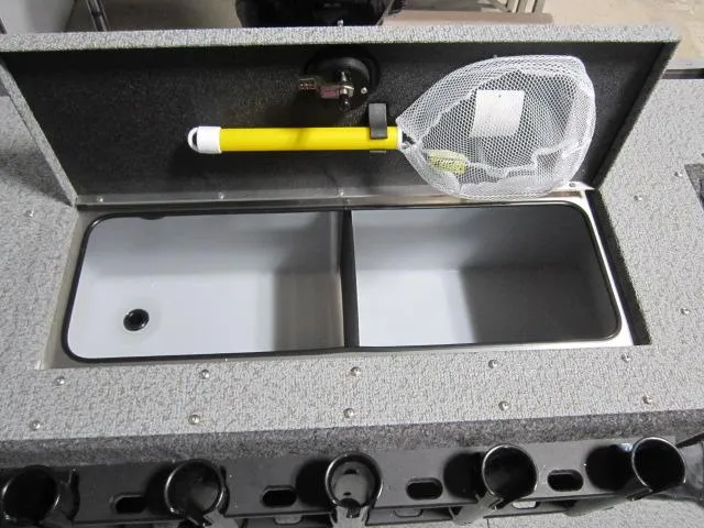 Slide: The Image of 2025 Lund 1875 Fisherman Sport livewell with net and rod holders. - 14